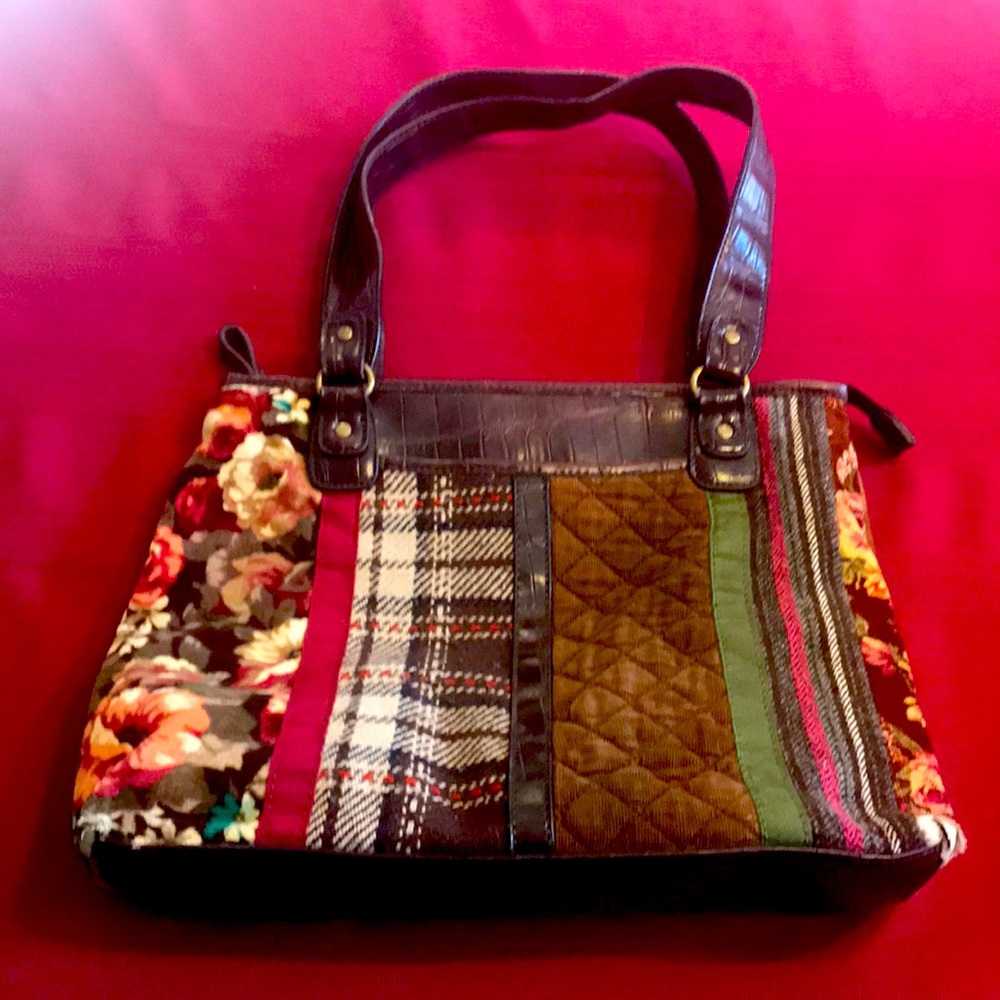 Relic brown corduroy purse with plaid and floral fabric striping & faux leather.